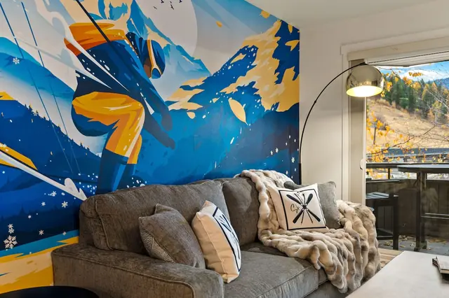 Sink into the sectional, let the lamp do the work while you scroll tomorrow's forecast, and leave the balcony door cracked for that first-chair excitement.