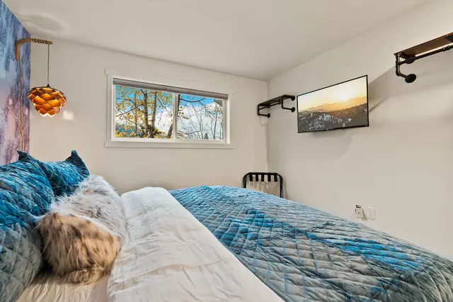 Watch the trees out the window until you drift off, or queue up a show on the TV before lights-out either way, you're not rushing tomorrow morning.