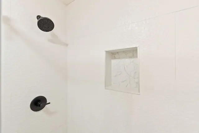 Grab the handheld for a faster rinse or stand under the rain shower head before you head out either way, this is a proper shower after a day in ski boots.