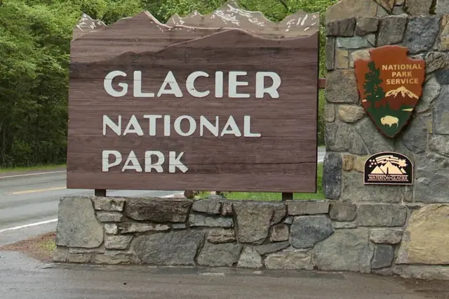 You'll pass this sign on the way in every single day Glacier's entrance really is just four minutes from your front door.