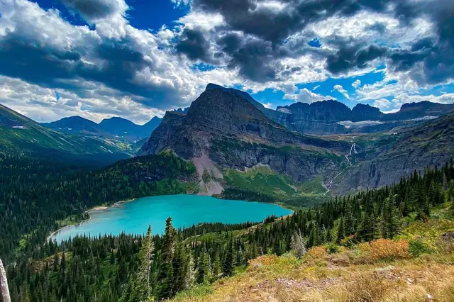 Pack a swimsuit for the short drive down the road Glacier's glacial-blue lakes like this one are less than 15 minutes from your condo.
