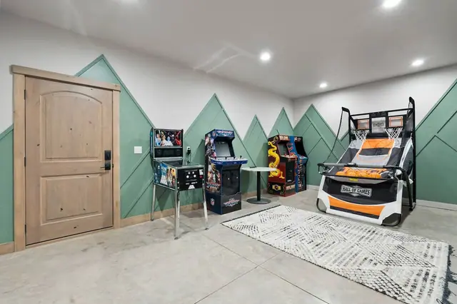 Grab a partner for pop-a-shot from this side of the room you'll find a rematch going every time the weather keeps everyone inside.