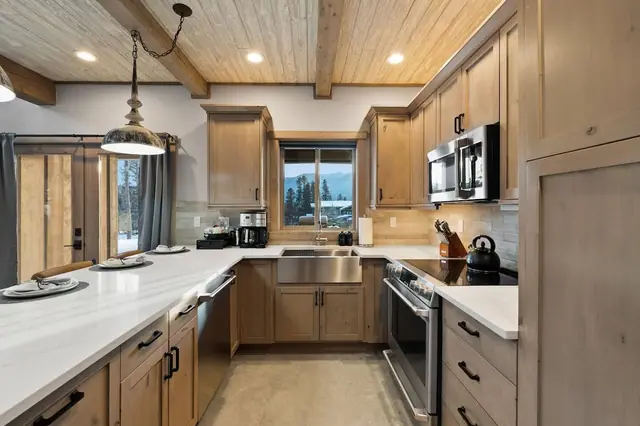 Cook a real dinner after a big day outside you'll have the farmhouse sink and full stainless lineup, so nobody's fighting over counter space tonight.