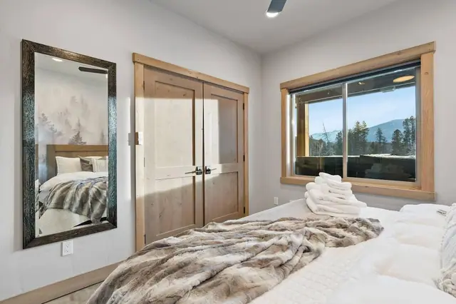 Hang your jacket in the closet and get settled fast this bedroom has its own space to unpack without living out of a suitcase.