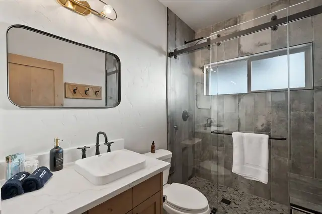 Rinse the trail dust off in the glass-enclosed shower before dinner the mountain view out the window makes even your quickest shower feel like part of the trip.