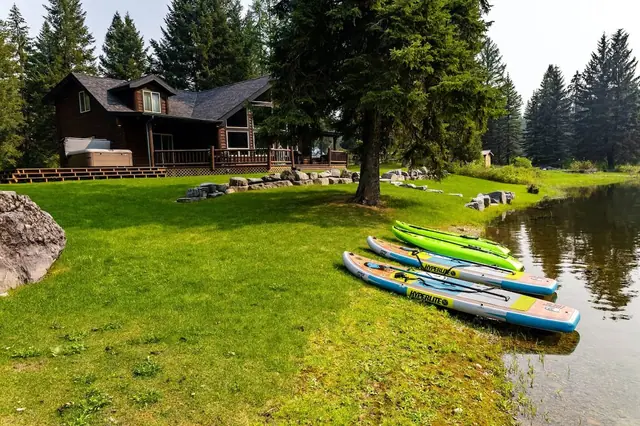 Grab a kayak or paddleboard right off the lawn, five are waiting for you steps from the water.