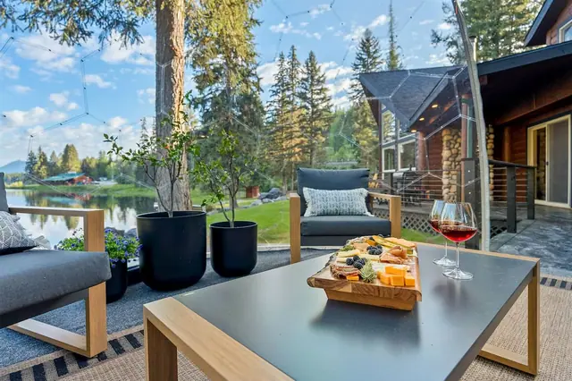 Set out a charcuterie board on your geodome patio table and let the pond views do the rest of the talking.