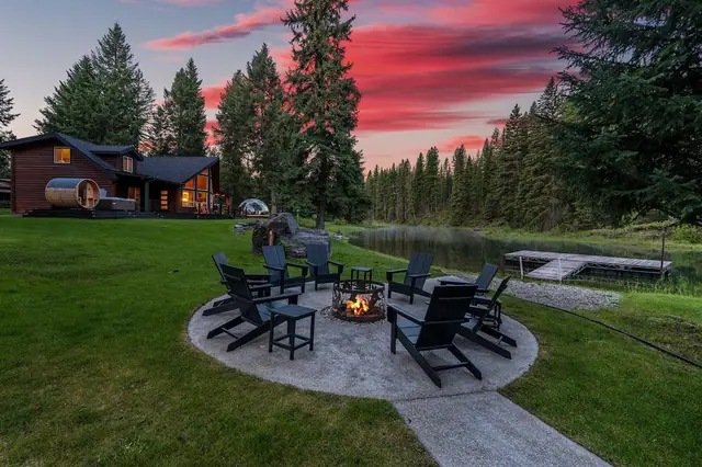 Watch the sunset from the fire pit patio, your barrel sauna and dock quietly waiting just beyond the flames.