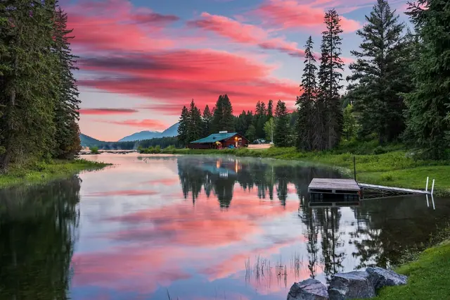 Wake up to this river channel view every morning, mountains catching the sunset light just past your dock.