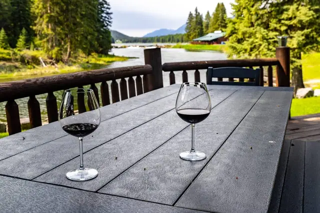 Pour two glasses and pull up to the outdoor table, lake and dock stretching out in front of you.