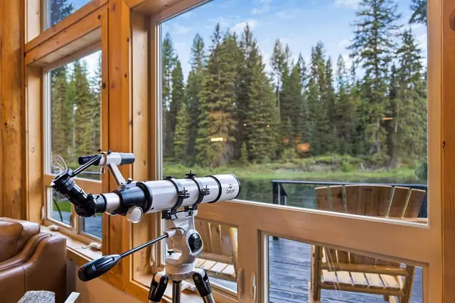 Point the telescope out over the river from your window seat and spend the evening tracking stars instead of screens.