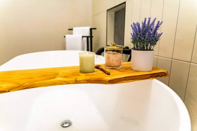 Light the candle, sprinkle in the bath salts, and let your soaking tub tray turn bathtime into a spa night.