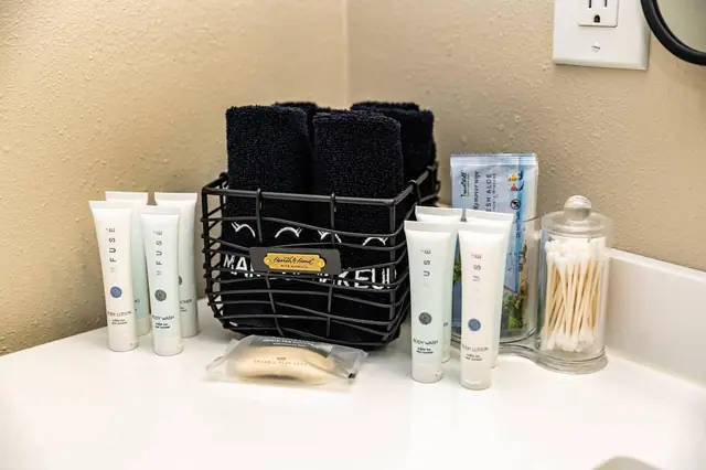 Skip packing toiletries, rolled washcloths, cotton swabs, and full-size essentials are already waiting for you.
