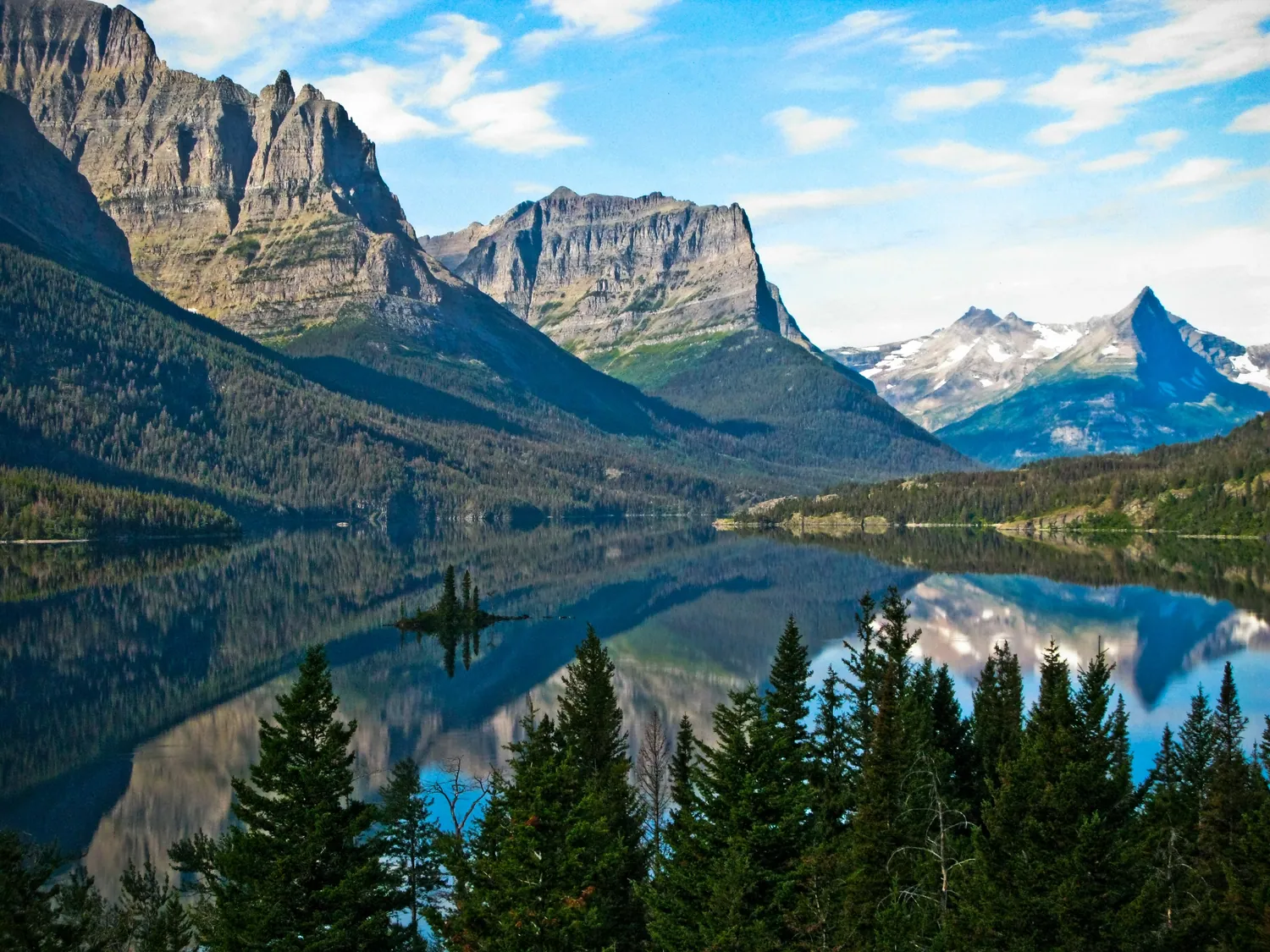 Saint Mary Lake at first light, peaks mirrored in still water