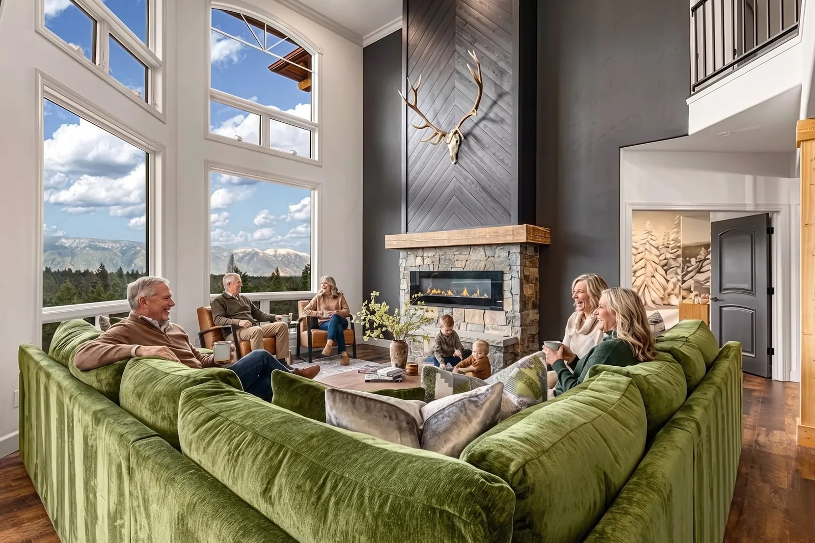 Three generations of one family talking on the green sofa in the great room at Soaring Eagle