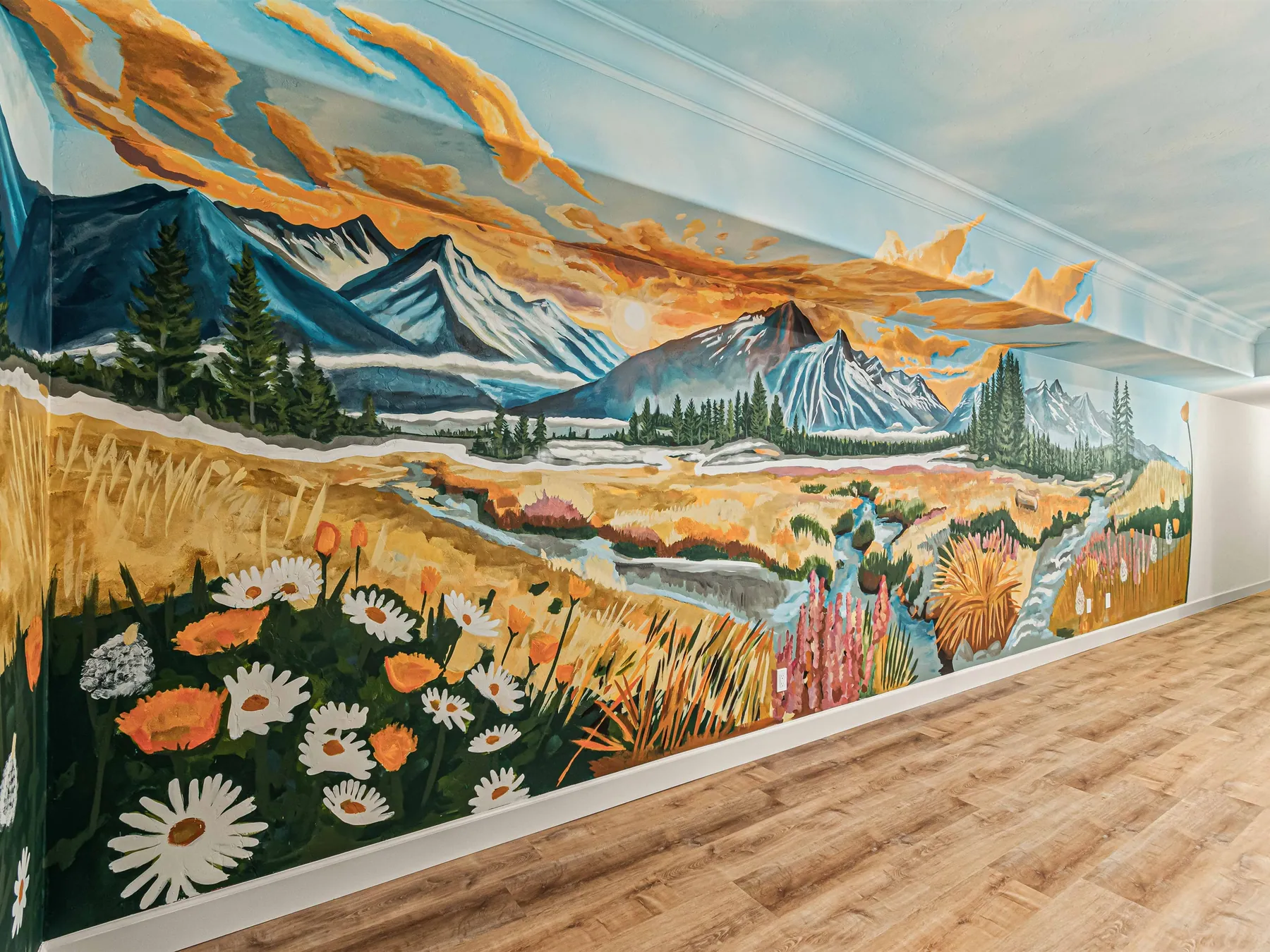 The hand-painted mountain mural that runs the length of the downstairs hall