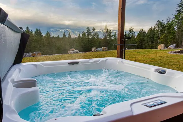 Ease into the jets while the mountain range stretches out beyond your tub's edge.
