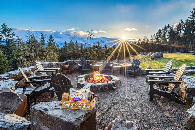 Pull your chair up to the fire pit as the sun drops behind the peaks and the s'mores station comes out.