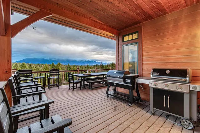 Fire up the grill and the pellet smoker on your covered deck and set the table for a mountain-view cookout.
