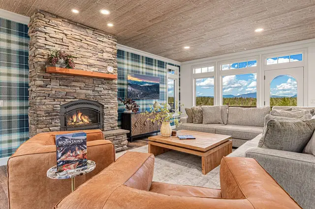 Sink into the arched-window nook of the sectional with the snow-capped mountains framed right outside your window.