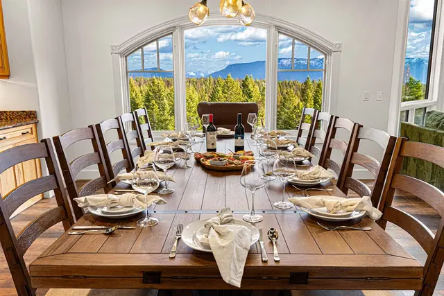 Uncork two bottles and lay out the cheese board while the arched window frames your snow-capped range.
