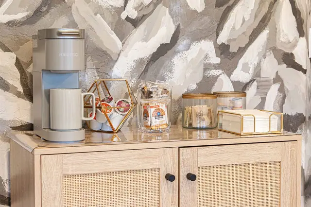 Brew a cup right in the suite before you even head downstairs the Keurig and snack jars are stocked and ready.