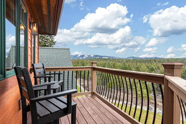 Take your coffee out to the private balcony chairs for a sweeping view of the range and pine forest.