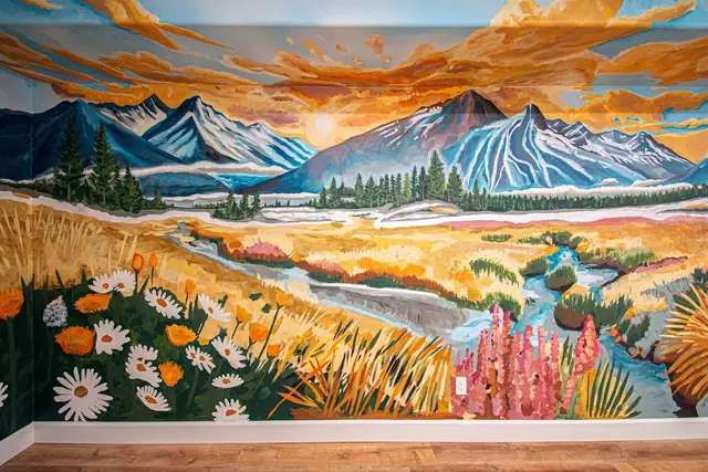 Pass the sunset half of the mural on your way down the hallway, daisies and wildflowers painted underfoot.