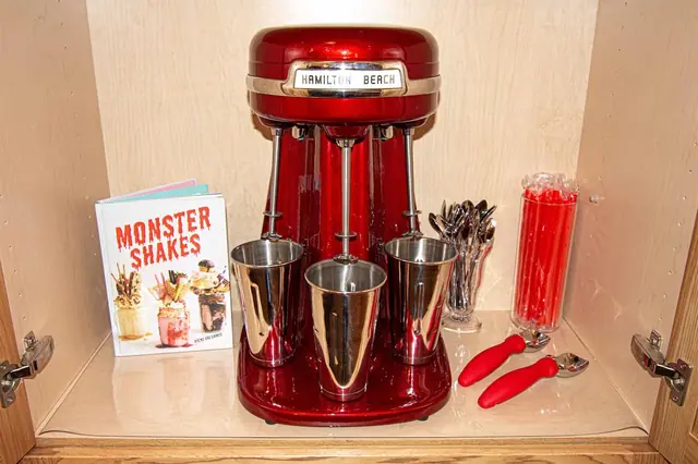 Spin up a milkshake in the vintage mixer using the Monster Shakes recipe book and grab a red straw to go.